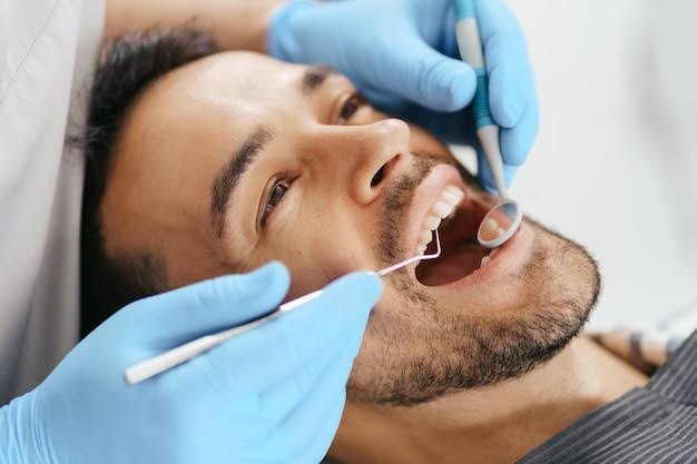 Happy patient smiling after dental treatment at Medina Dental